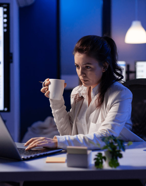 a cyber security expert women working on laptop